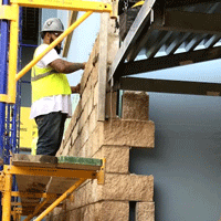 worker building with wood